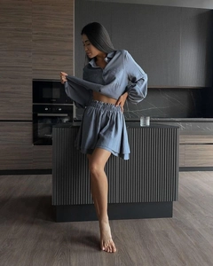 Detail of grey-blue two-piece leisure set showing breathable cotton-linen texture