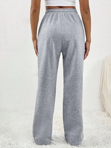 Vue arrière du pantalon de jogging gris chiné pour femme avec taille haute élastique