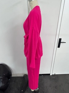 Side view of comfortable rose pink loungewear set featuring long sleeves and waist tie