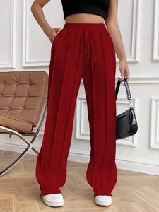Pantalon de jogging large bordeaux à cordon de serrage et rayures verticales décontracté