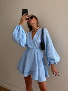Fashionable light blue V-neck mini dress with puff sleeves and elastic waist design