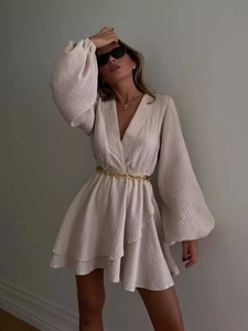 Elegant beige V-neck mini dress with puff lantern sleeves and gold leaf chain belt