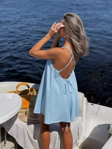 Light blue backless halter summer dress with crisscross straps for beach vacation
