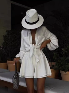 Women's summer white two-piece set featuring long sleeve tie-up shirt and high waist shorts