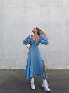 Light blue square neck dress with puff sleeves and side slit shown on female model