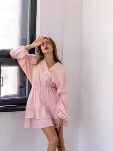 Pink long sleeve V-neck mini dress with ruffled hem and textured fabric for summer