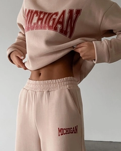 Detail of nude pink Michigan sweatshirt and matching joggers set in soft cotton fabric