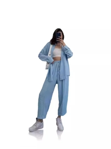Women light blue casual two-piece set featuring lapel shirt and elastic waist trousers