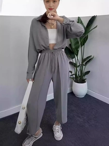 Women's two-piece set featuring grey lapel shirt and high waist wide leg trousers
