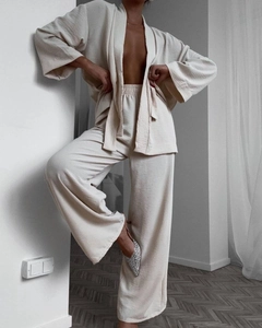 Detail showing the crinkle texture and premium fabric of this beige two-piece pajama set