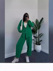 Casual green two-piece set for women featuring lapel shirt and high-waist wide-leg pants