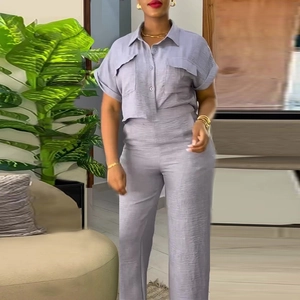 Women's two-piece lavender set with short sleeve button shirt and wide leg trousers