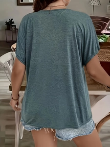 Detailed back view of a teal lace-spliced V-neck short sleeve top for women