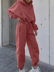 Close-up of Morandi pink 2-piece fleece hoodie and jogger tracksuit for women