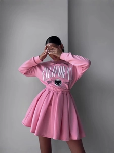 Pink fleece sweatshirt and pleated mini skirt set with American street style graphics