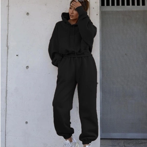 Women's casual black hooded tracksuit set featuring loose sweatshirt and joggers