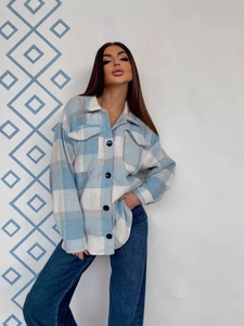 Blue and white plaid long sleeve flannel shacket with large pockets and buttons
