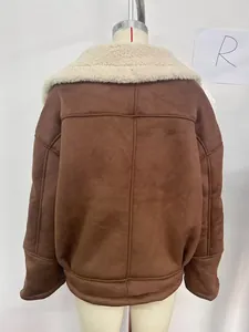 Detail view of the vintage brown faux suede jacket featuring warm faux shearling lining