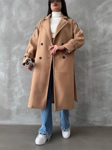 Elegant camel wool coat for women featuring a lapel collar and stylish double-breasted design