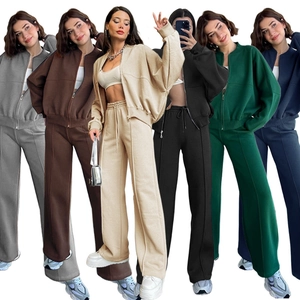 Detail view of high-waist joggers with front seam stitching and drawstring waistband