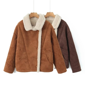 Detail of faux suede jackets with fuzzy shearling lining in brown and coffee colors