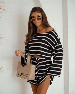 Detail of the knit texture and black and white striped pattern on the two-piece set