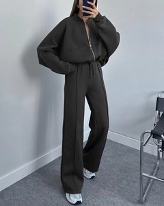 Detail of dark grey zip-up hoodie set with straight-leg pants and seam decorative line