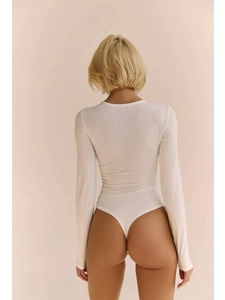Rear view of white long sleeve bodysuit showing thong cut and slim fit elastic fabric
