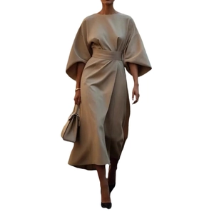 Elegant khaki maxi dress featuring dramatic bell sleeves and a cinched waist design
