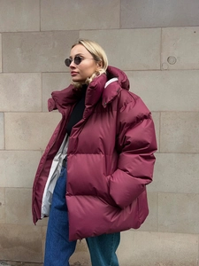 Oversized burgundy hooded winter puffer jacket with grey lining and matte finish