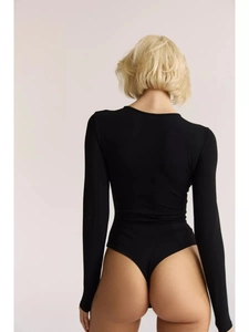 Rear view of black long sleeve bodysuit with high-cut thong design and stretch fit
