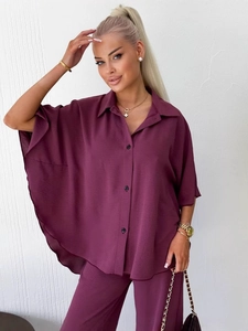 Women's burgundy long sleeve button-up shirt and wide leg pants set with textured fabric