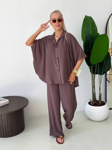 Chic dark brown two-piece set featuring loose long sleeve shirt and wide leg trousers