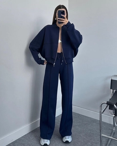 Deep blue zip-up jacket and wide-leg trousers set with vertical seam details