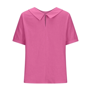 Detail of peach pink short sleeve shirt featuring a Peter Pan collar and back cutout