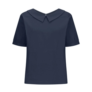 Close-up of navy blue short-sleeve blouse with Peter Pan collar and waist seam detail
