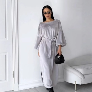 Detail of light grey fleece maxi dress featuring a waist tie and side slit design