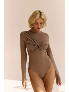 Detail of twist-front knot on long sleeve taupe bodysuit with elegant fabric drapes