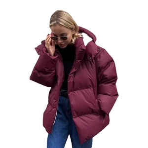 Oversized burgundy hooded puffer jacket for women with quilted design and warm loose fit