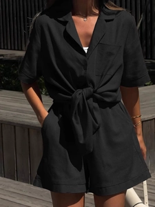 Damen Jumpsuit in Schwarz mit Reverskragen und Taillenbindung für den Sommer Mode