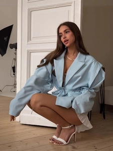 Light blue padded shoulder blazer with waist tie and pleated sleeves for women