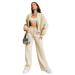 Women's chic beige two-piece lounge set with zip hoodie and wide-leg trousers