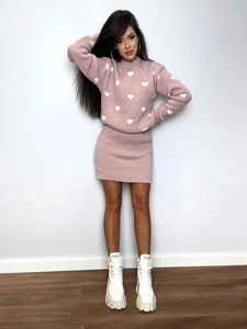 Pink knit sweater and mini skirt set with white heart patterns and long sleeves