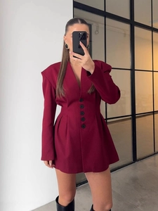 Chic maroon long sleeve blazer dress with padded shoulders and waist pleat detail