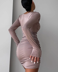 Detail shot of mauve ruched slim fit long sleeve dress with premium elastic texture