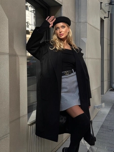 Elegant black long wool coat with belted waist and sophisticated silhouette for women