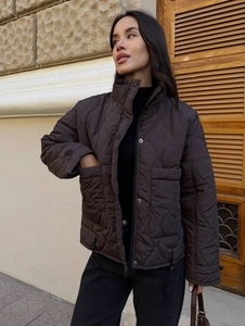 Women's dark brown quilted winter jacket with stand collar and button closure