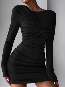 Elegant black slim fit long sleeve dress with ruched details and a bodycon silhouette