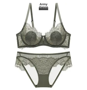 Detailed flat lay of army green lace lingerie set featuring sheer floral bra and panties