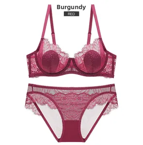Detail of wine red lace lingerie set featuring floral embroidery and mesh panties